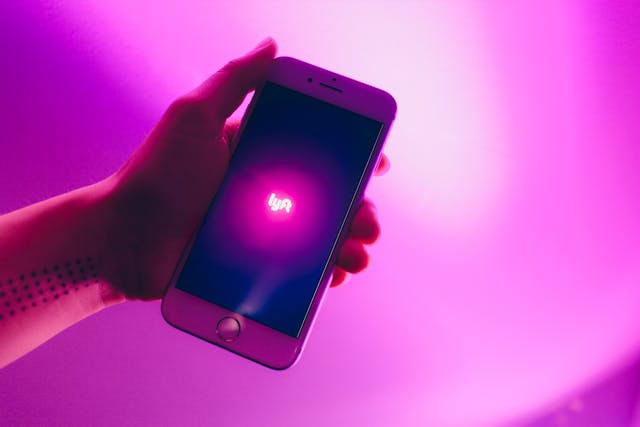 smartphone with lyft rideshare app