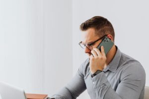 man speaking on phone